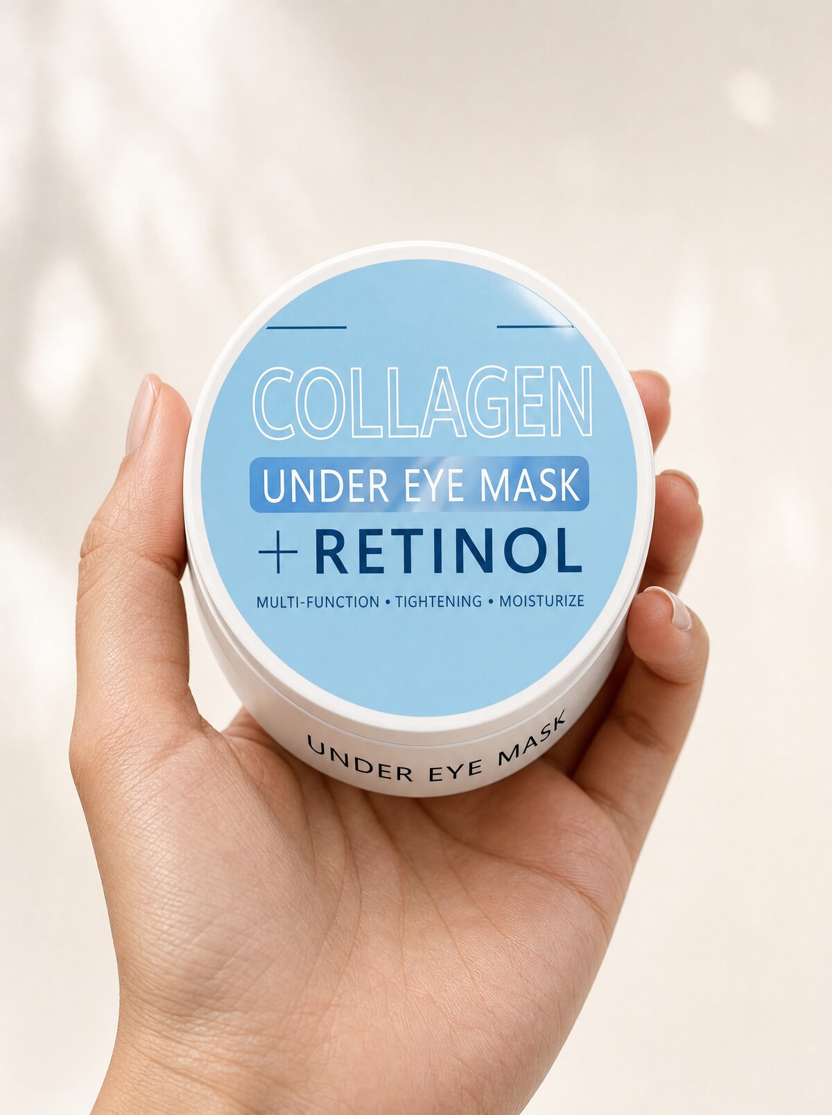 Collagen Under-Eye Mask + Retinol in hand